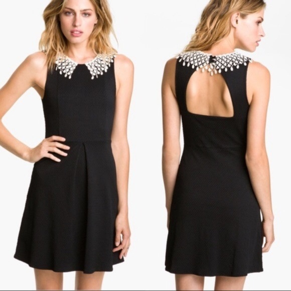 black dress with white lace collar